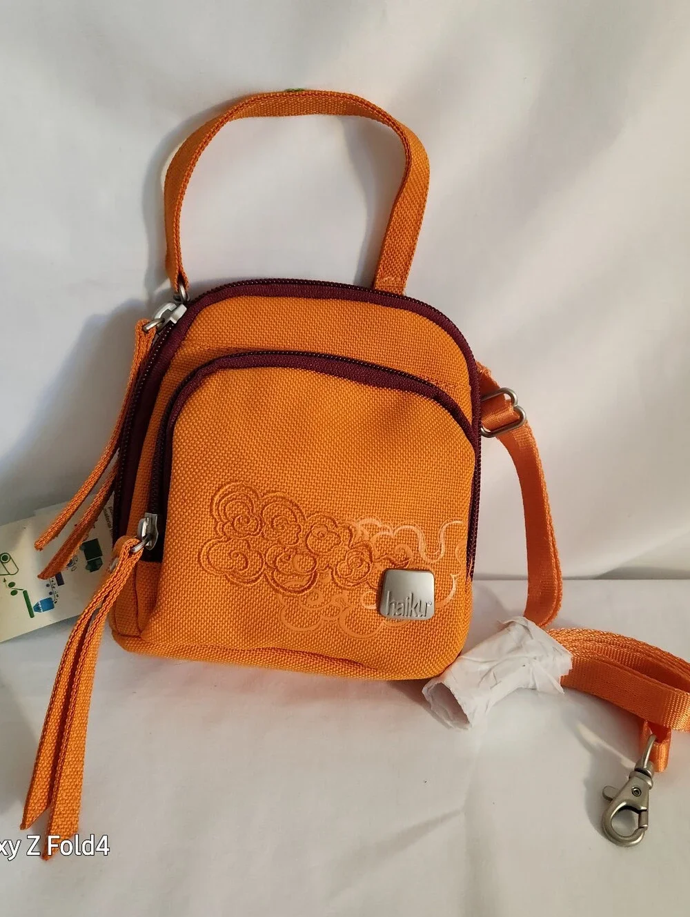 Haiku Orange Crossbody with Plum Trim and Embroidered Swirls